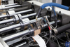 Machine de fabrication de sacs intelligents avec une poignée torsadée
