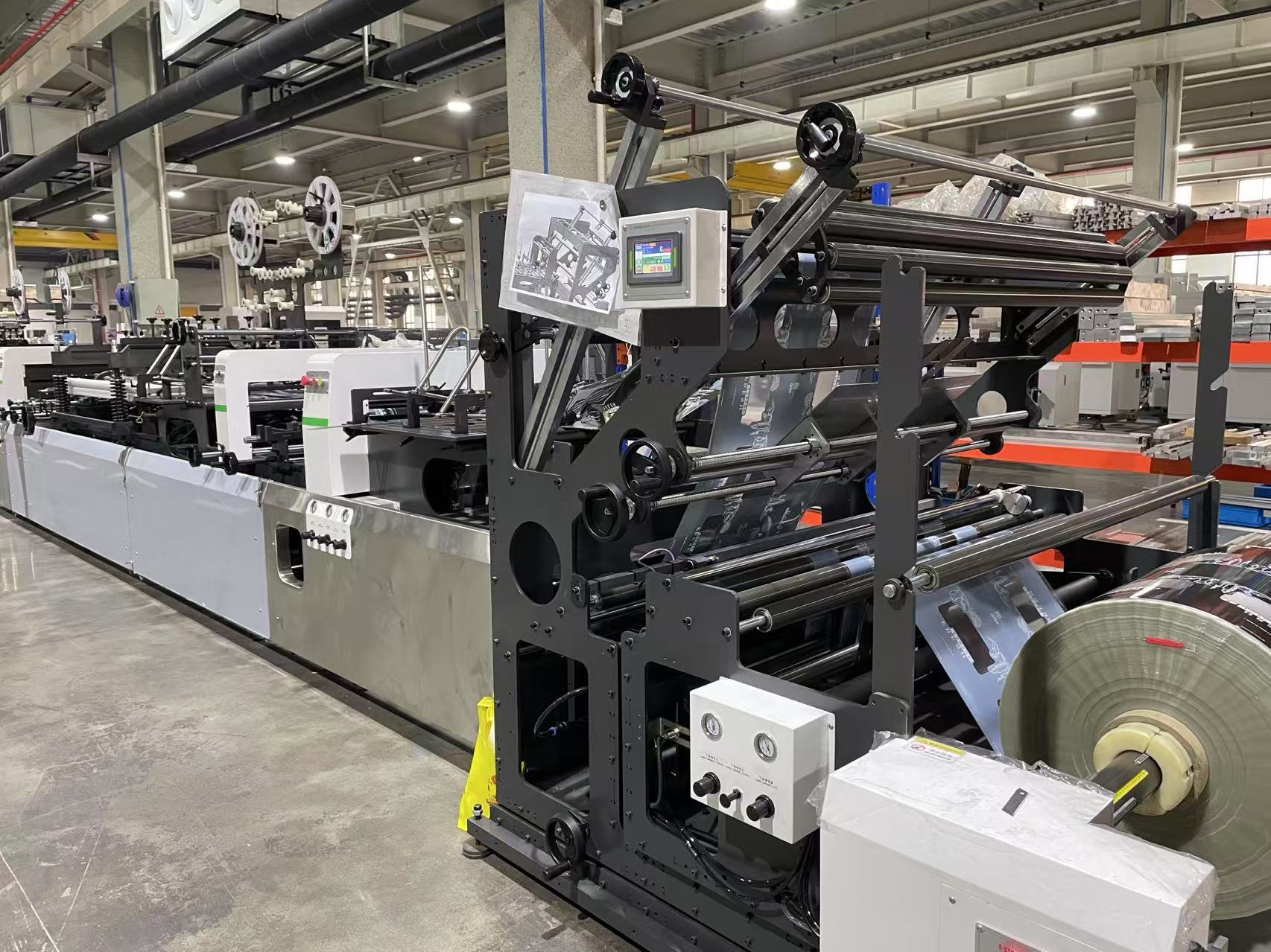 Machine de fabrication de sachets de joint central à haute vitesse / quad